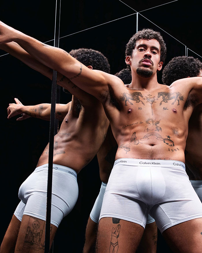 Male celebrity with tattoos posing shirtless in white Calvin Klein underwear, revealing more than expected in 2025 frenzy. Male celebrity with tattoos posing shirtless in white Calvin Klein underwear, revealing more than expected in 2025 frenzy.