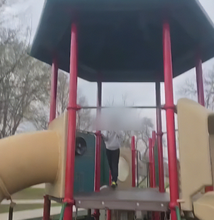 Playground structure with blurred figure, related to viral mom who called autistic boy the N-word facing trial. Playground structure with blurred figure, related to viral mom who called autistic boy the N-word facing trial.