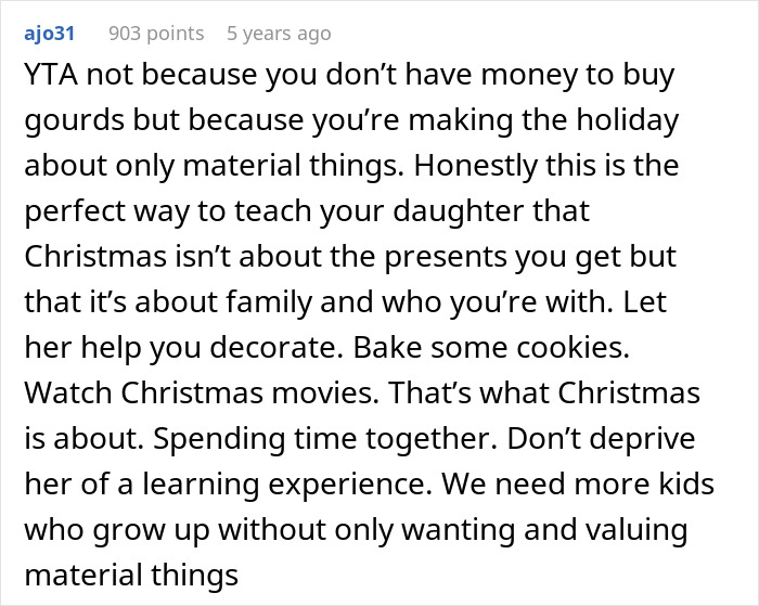 Reddit comment discussing a father wanting to cancel Christmas due to affordability and focusing on family over material gifts.
