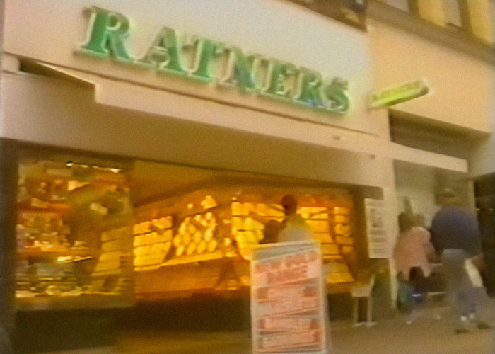 Ratners storefront with shoppers walking by, representing companies known for dumb ways they went out of business.