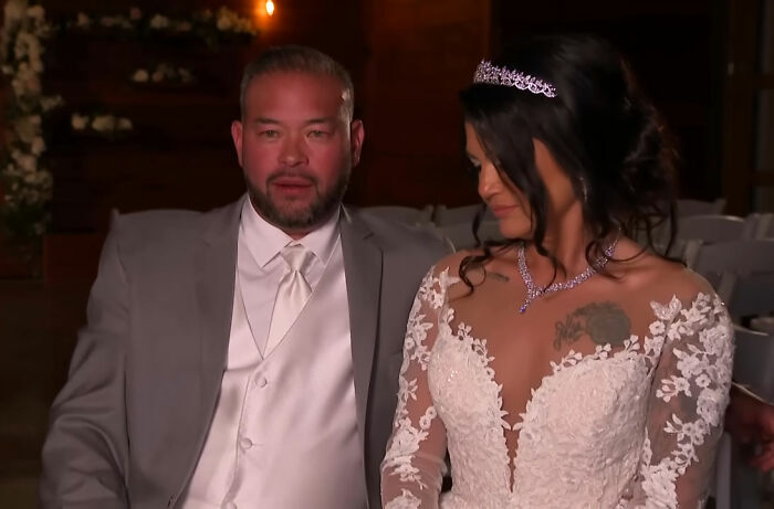Jon Gosselin in a gray suit and bride in lace dress and tiara during their wedding ceremony after 16 years. Jon Gosselin in a gray suit and bride in lace dress and tiara during their wedding ceremony after 16 years.