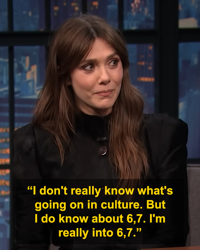 Elizabeth Olsen on a talk show discussing the viral 6,7 meme with a thoughtful expression. Elizabeth Olsen on a talk show discussing the viral 6,7 meme with a thoughtful expression.