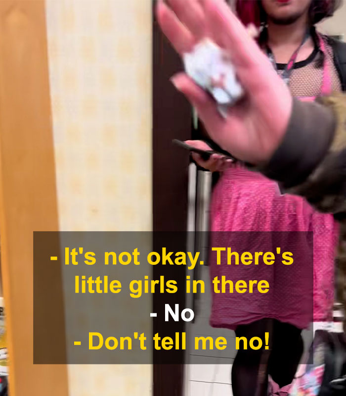 Woman upset confronting bearded trans man in women’s restroom, sparking debate and tense interaction over bathroom access. Woman upset confronting bearded trans man in women’s restroom, sparking debate and tense interaction over bathroom access.