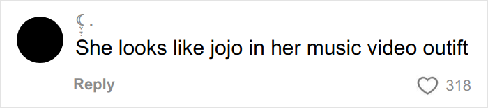 Comment on social media post expressing an opinion about a woman's music video outfit, with 318 likes.