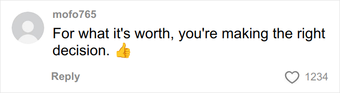 Woman with a prominent face tattoo speaking at a mental health advocacy event, sharing her personal story and insights.