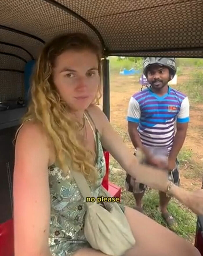 Woman solo traveling records local man's disturbing behavior while seated inside a vehicle, showing concern and discomfort. Woman solo traveling records local man's disturbing behavior while seated inside a vehicle, showing concern and discomfort.