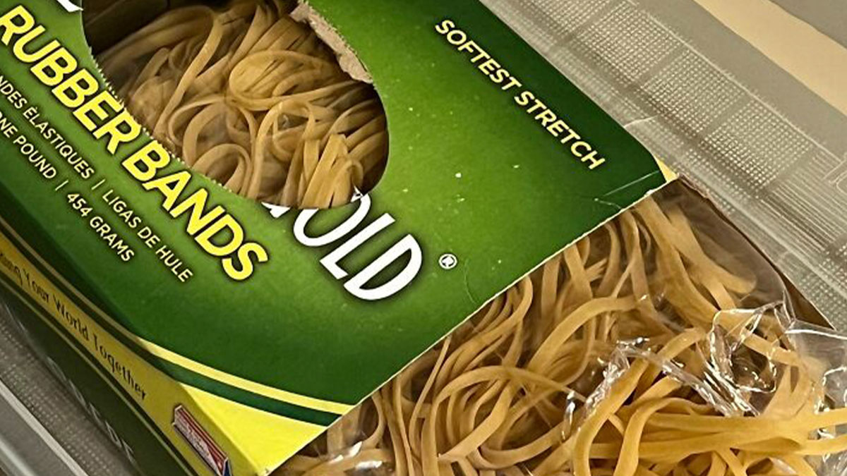 Package of rubber bands spilling out, illustrating a common forbidden food hazard to resist eating for health.