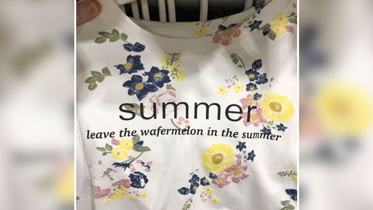 White English t-shirt with floral print and funny lost in translation text about summer and wafermelon.