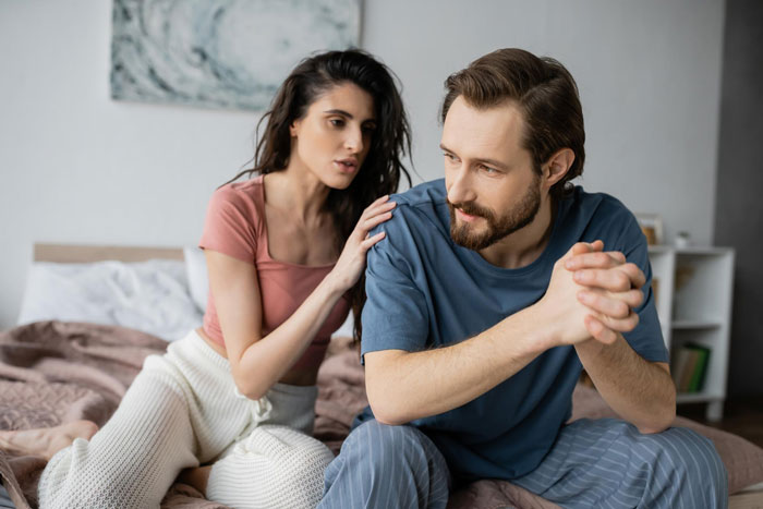 Woman’s husband comforting her as she shows signs of obsession over pregnancy, indicating a possible life-threatening condition. Woman’s husband comforting her as she shows signs of obsession over pregnancy, indicating a possible life-threatening condition.