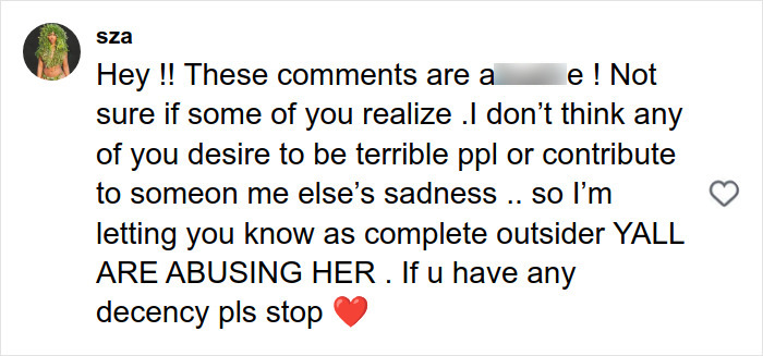 Comment from user sza addressing negativity and a***e, urging kindness and stopping hateful remarks about stretch marks on skin. Comment from user sza addressing negativity and a***e, urging kindness and stopping hateful remarks about stretch marks on skin.