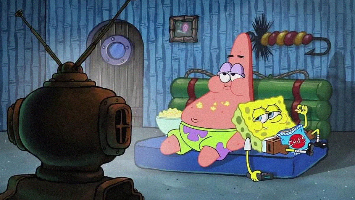 SpongeBob and Patrick relaxing on a couch watching TV, enjoying snacks in a cozy underwater living room scene.