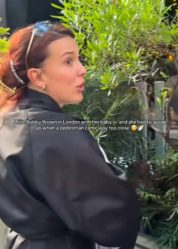 Millie Bobby Brown protecting her baby from a pedestrian while Jake Bongiovi is called out for not helping. Millie Bobby Brown protecting her baby from a pedestrian while Jake Bongiovi is called out for not helping.