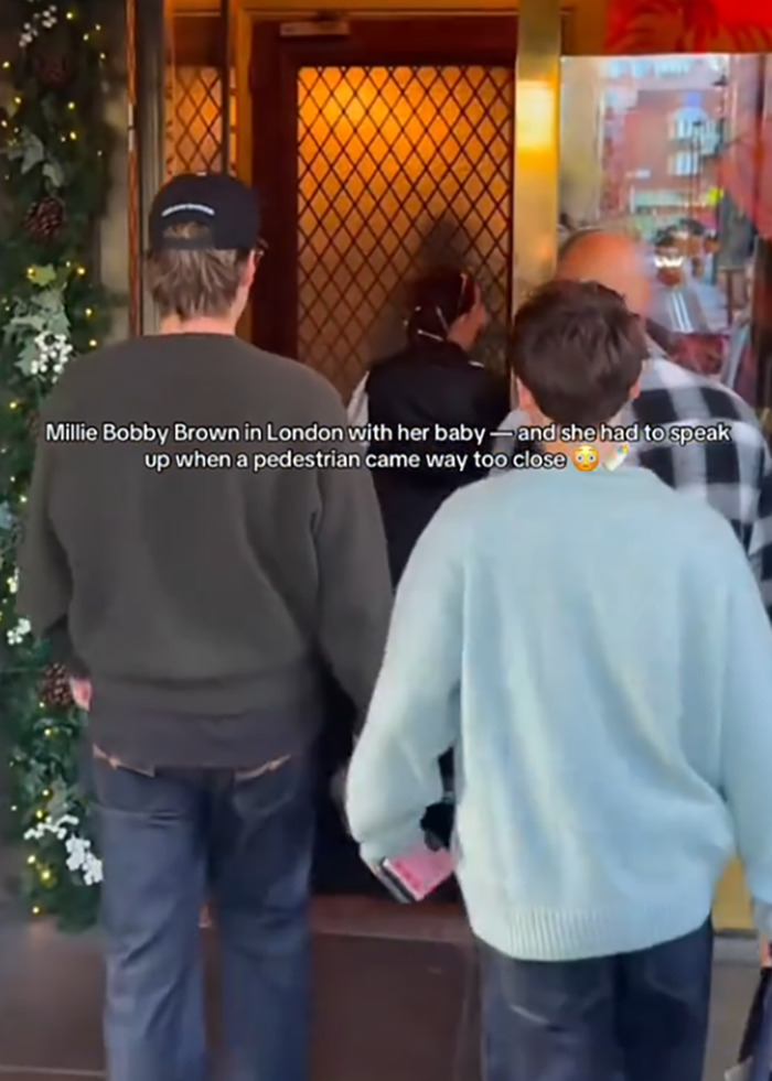 Jake Bongiovi criticized for not helping while Millie Bobby Brown protects their baby outside building in London. Jake Bongiovi criticized for not helping while Millie Bobby Brown protects their baby outside building in London.