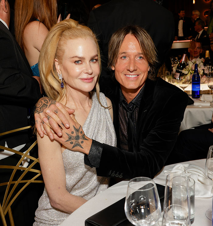 Nicole Kidman and Keith Urban smiling at an event, with Nicole Kidman update on divorce drawing criticism. Nicole Kidman and Keith Urban smiling at an event, with Nicole Kidman update on divorce drawing criticism.