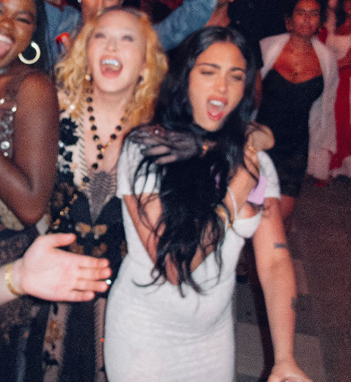 Group of smiling celebrities partying and revealing more than they should have, sparking a frenzy in 2025. Group of smiling celebrities partying and revealing more than they should have, sparking a frenzy in 2025.