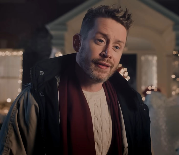 Macaulay Culkin outdoors wearing a coat and scarf, reminding fans about his legal name change. Macaulay Culkin outdoors wearing a coat and scarf, reminding fans about his legal name change.