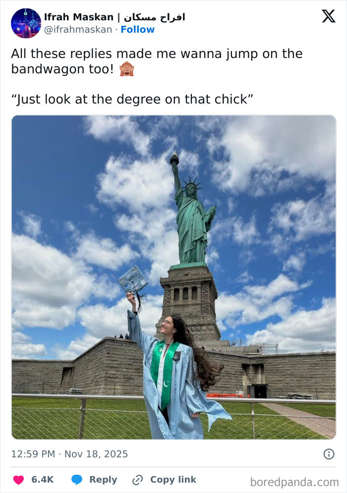 Woman celebrates PhD achievement in front of the Statue of Liberty, symbolizing women’s success and empowerment. Woman celebrates PhD achievement in front of the Statue of Liberty, symbolizing women’s success and empowerment.