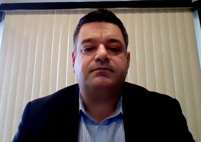 Campbell's executive in a virtual meeting, serious expression, discussing leaked audio and soup ingredients controversy. Campbell's executive in a virtual meeting, serious expression, discussing leaked audio and soup ingredients controversy.