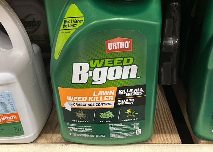 Container of lawn weed killer on a store shelf illustrating dangerous things in everyday life for medical malpractice lawyer.
