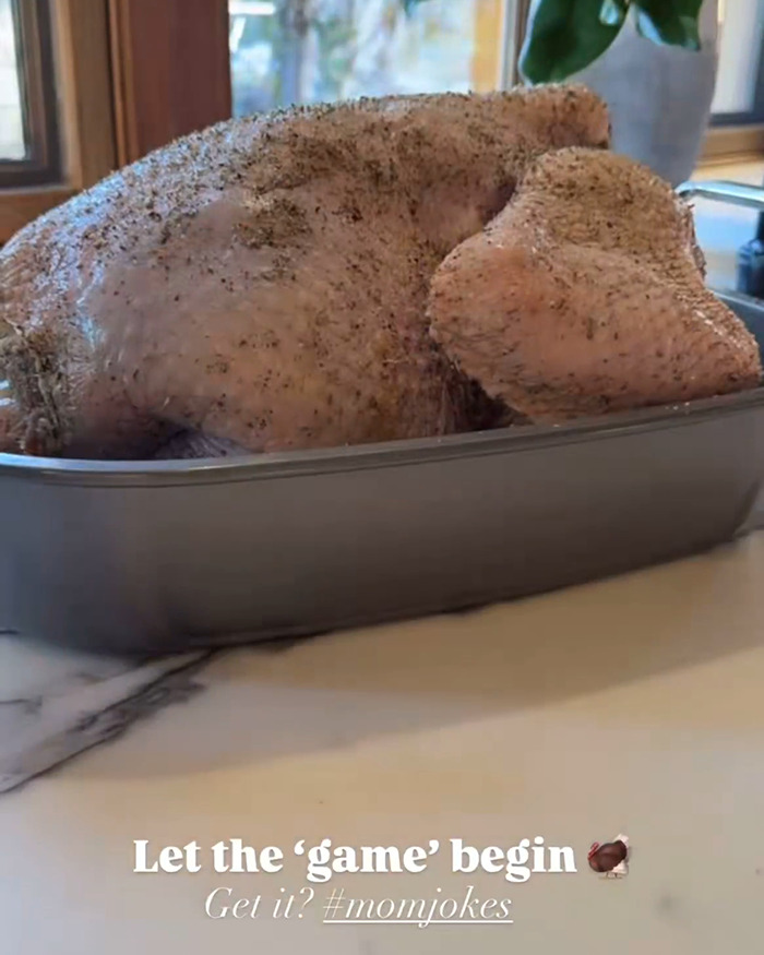 Raw seasoned Thanksgiving turkey in a roasting pan, highlighting Meghan Markle Thanksgiving turkey faux pas humor. Raw seasoned Thanksgiving turkey in a roasting pan, highlighting Meghan Markle Thanksgiving turkey faux pas humor.