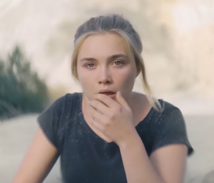 Florence Pugh outdoors in a black shirt, looking thoughtful while reflecting on age gap and public reaction. Florence Pugh outdoors in a black shirt, looking thoughtful while reflecting on age gap and public reaction.