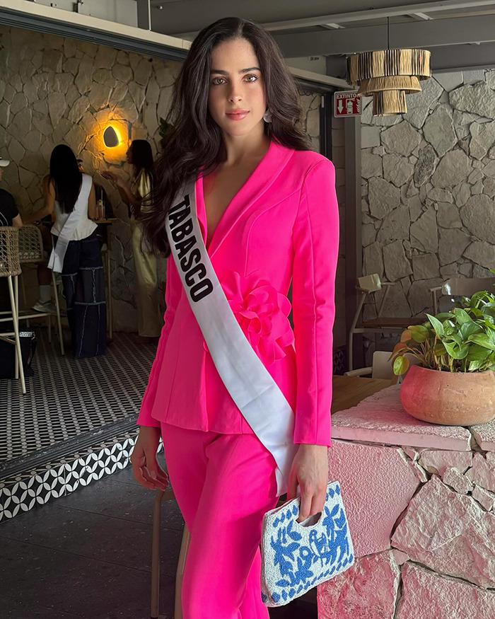 Miss Mexico contestant in bright pink suit with sash at Miss Universe event amid drama erupting over VP comment. Miss Mexico contestant in bright pink suit with sash at Miss Universe event amid drama erupting over VP comment.