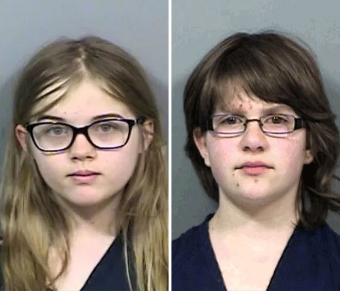 Two young individuals with glasses shown in police mugshots related to Slender Man attacker and nationwide manhunt. Two young individuals with glasses shown in police mugshots related to Slender Man attacker and nationwide manhunt.