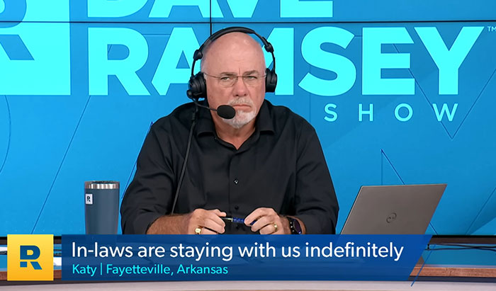 Radio host Dave Ramsey wearing headset, responding to a desperate newlywed caller about relationship and family issues. Radio host Dave Ramsey wearing headset, responding to a desperate newlywed caller about relationship and family issues.
