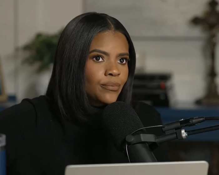 Erika Kirk speaking into a microphone during a Fox interview, fueling theories about the real culprit still free.