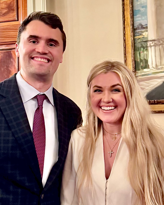 Erika Kirk smiling during Fox interview, fueling theories about the real culprit still being free in a formal indoor setting.