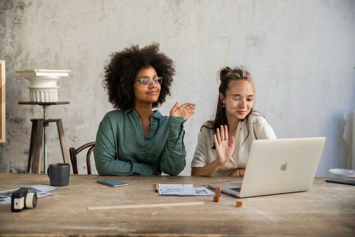 Two women engaging in a video call, realizing compulsory things in life might actually be optional moments.