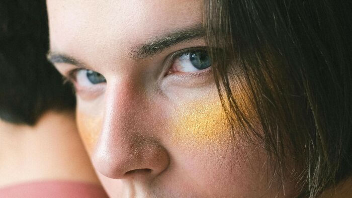 Close-up of a person’s eyes showing face reading skills to guess celebrities using main facial features and expressions. Close-up of a person’s eyes showing face reading skills to guess celebrities using main facial features and expressions.