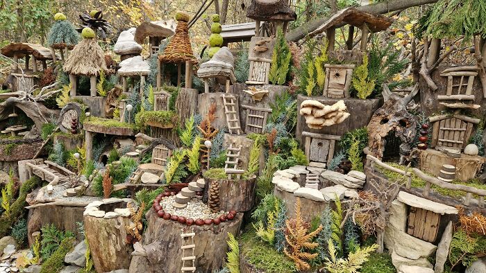 Miniature fantasy village made of natural materials showcasing fictional worlds in a famous movie settings quiz concept. Miniature fantasy village made of natural materials showcasing fictional worlds in a famous movie settings quiz concept.