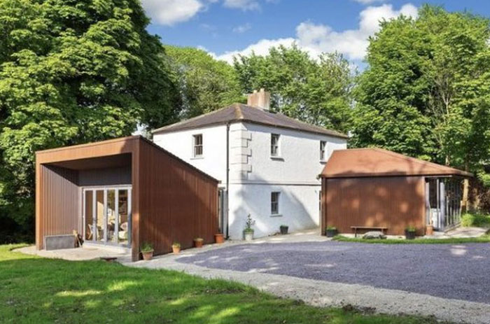 Modern house with mismatched architectural designs, showing design and architecture nightmares in a residential setting.