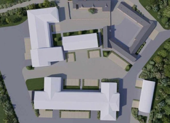 Aerial view of a poorly designed architectural layout showing impractical building placements and awkward spatial planning.