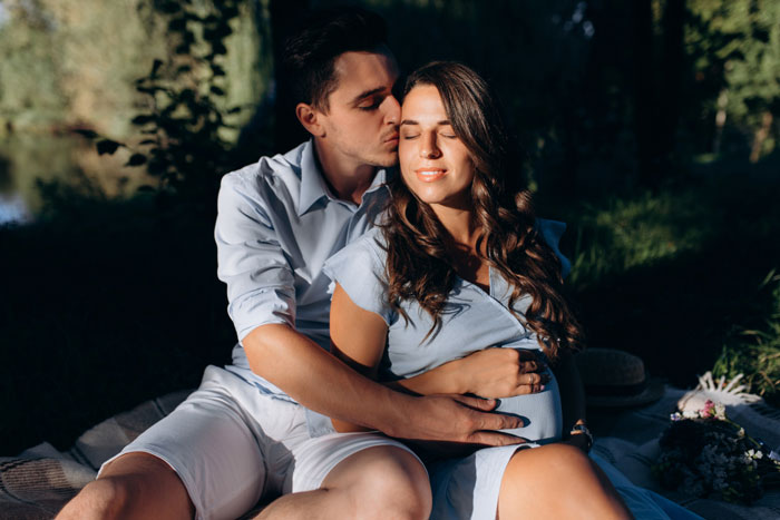 Couple embracing outdoors in a tender moment, highlighting themes of family and reconciliation after long silence. Couple embracing outdoors in a tender moment, highlighting themes of family and reconciliation after long silence.