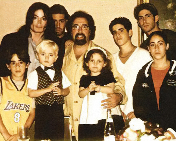 Michael Jackson with siblings and family members in a vintage photo linked to disturbing new allegations.