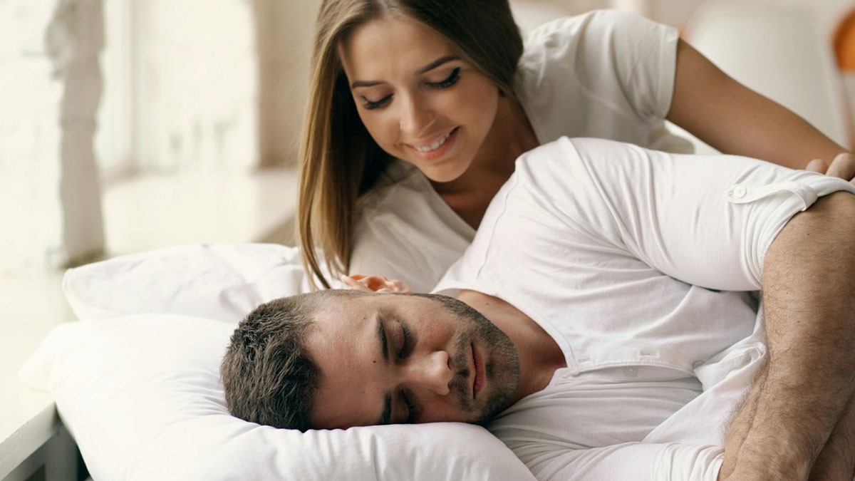 Young couple discovering surprising habits and secrets after moving in together, sharing a tender moment at home.