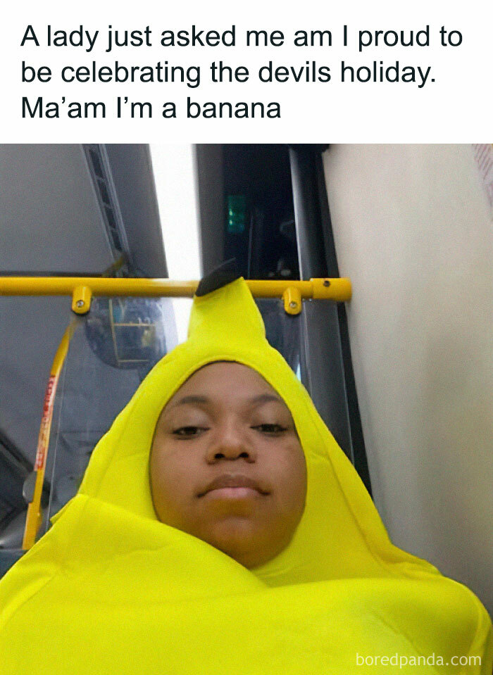 Person wearing a bright yellow banana costume on a bus, featured in stupid food memes for stupid people.