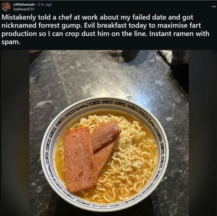 Bowl of instant ramen with spam on a dark countertop, featured in stupid food memes for stupid people.