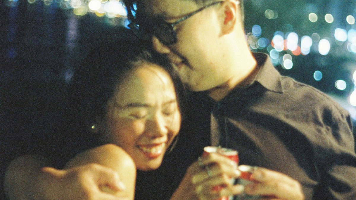 Young couple sharing a close moment at night, symbolizing love and friendship before lies and broken trust emerge.