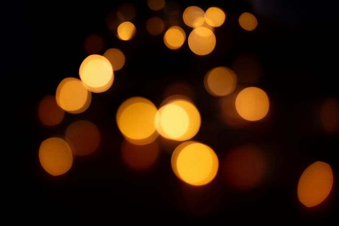 Blurry orange lights creating an eerie atmosphere resembling nightmare fuel captured by surveillance cameras at night.