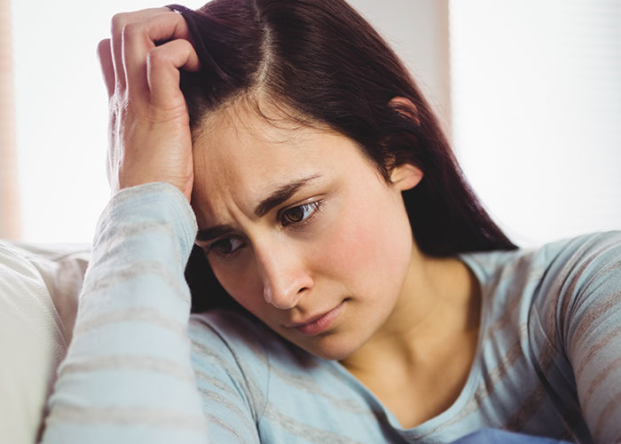 Woman looking stressed and frustrated, expressing she doesn’t want to cook a foreign traditional Christmas spread. Woman looking stressed and frustrated, expressing she doesn’t want to cook a foreign traditional Christmas spread.