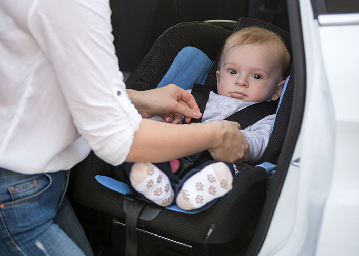 Man upset as nurse girlfriend prioritizes baby and dogs during car crash, fastening baby in car seat with concern. Man upset as nurse girlfriend prioritizes baby and dogs during car crash, fastening baby in car seat with concern.