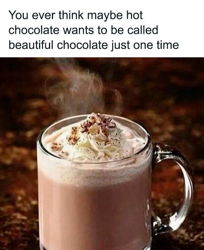 Steaming hot chocolate with whipped cream and cocoa, a funny meme to brighten dark and cold winter days.