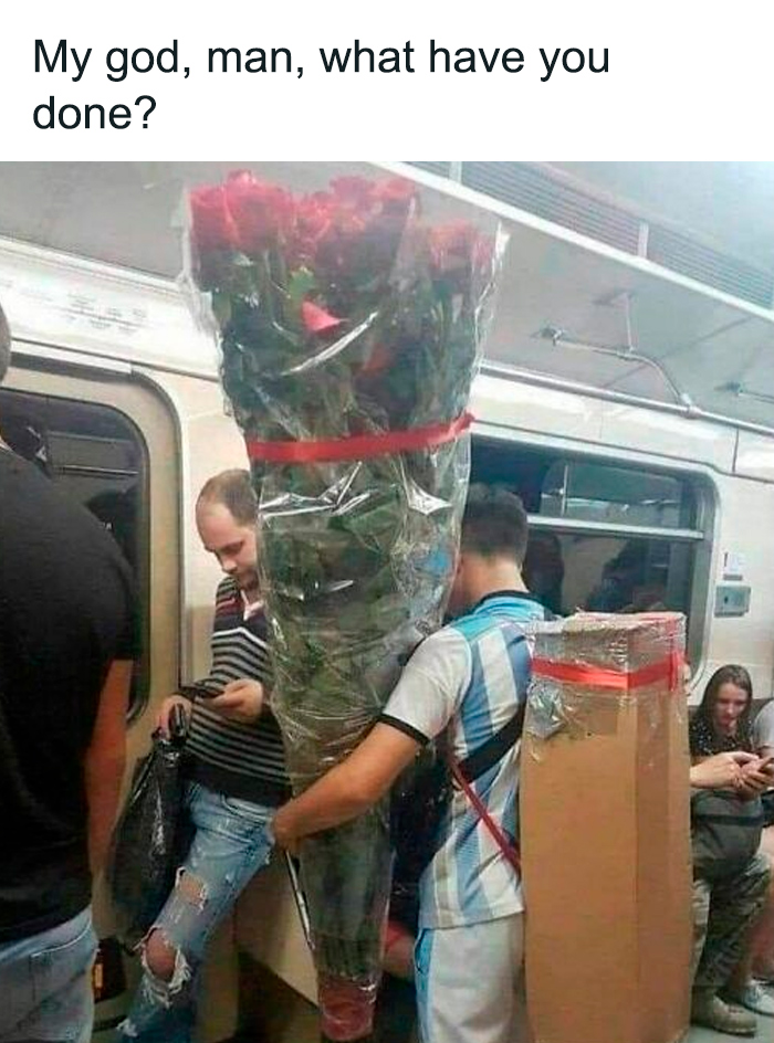 Man holding an oversized bouquet of roses on crowded public transport, a humorous scene from funny memes collection.