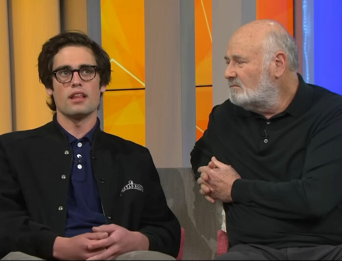 Two men in a studio discussing the horrific state of Nick Reiner's hotel room amid arrest for Father Rob's slaying. Two men in a studio discussing the horrific state of Nick Reiner's hotel room amid arrest for Father Rob's slaying.