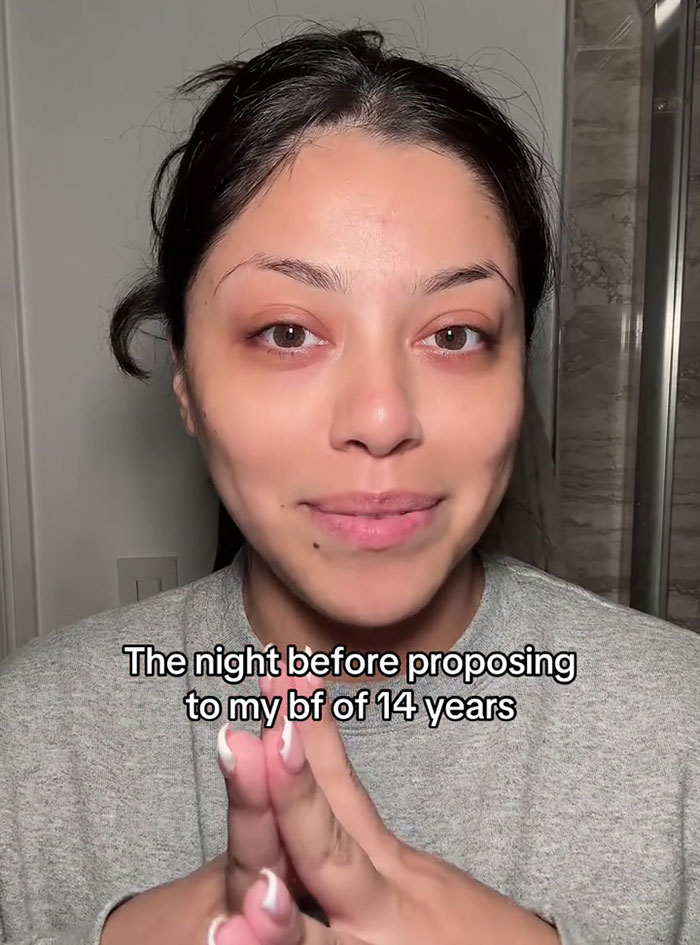 Woman preparing for her proposal to her boyfriend of 14 years, capturing an emotional and heartfelt moment. Woman preparing for her proposal to her boyfriend of 14 years, capturing an emotional and heartfelt moment.