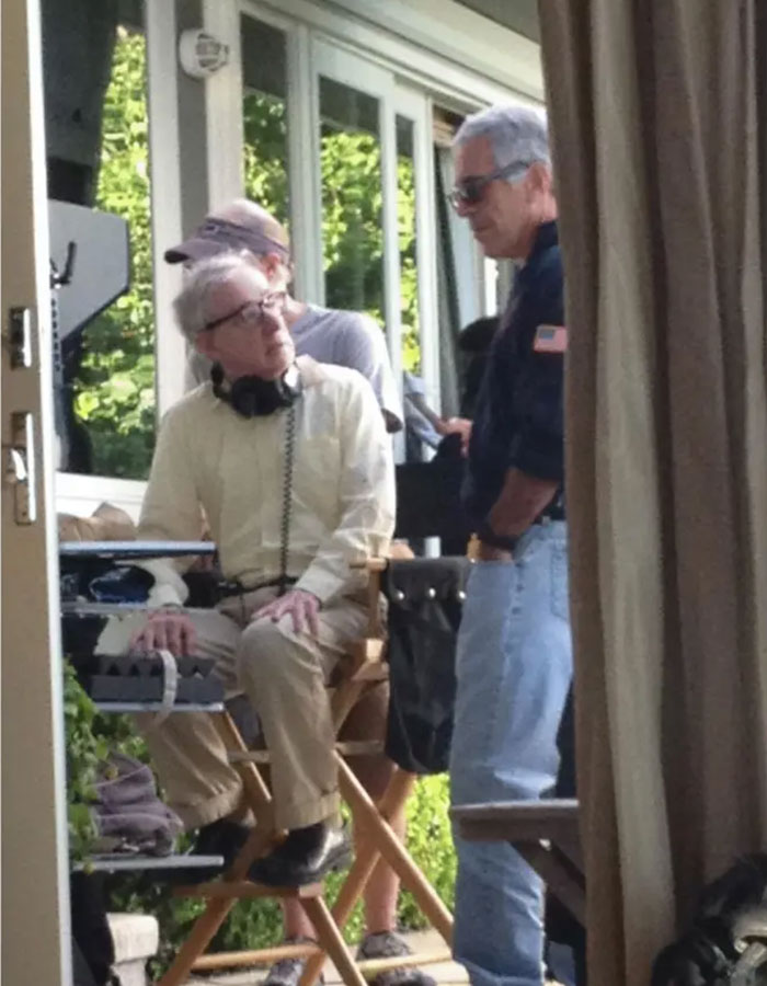Three men in casual clothes on a patio with trees outside, related to disturbing Epstein desk photo backlash estate images.