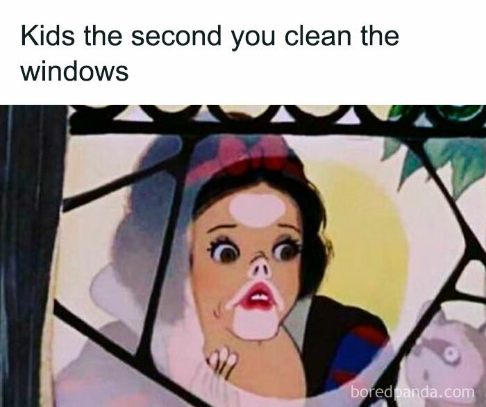 Child making a funny face behind a window with text about kids immediately marking windows after cleaning relatable memes for parents.